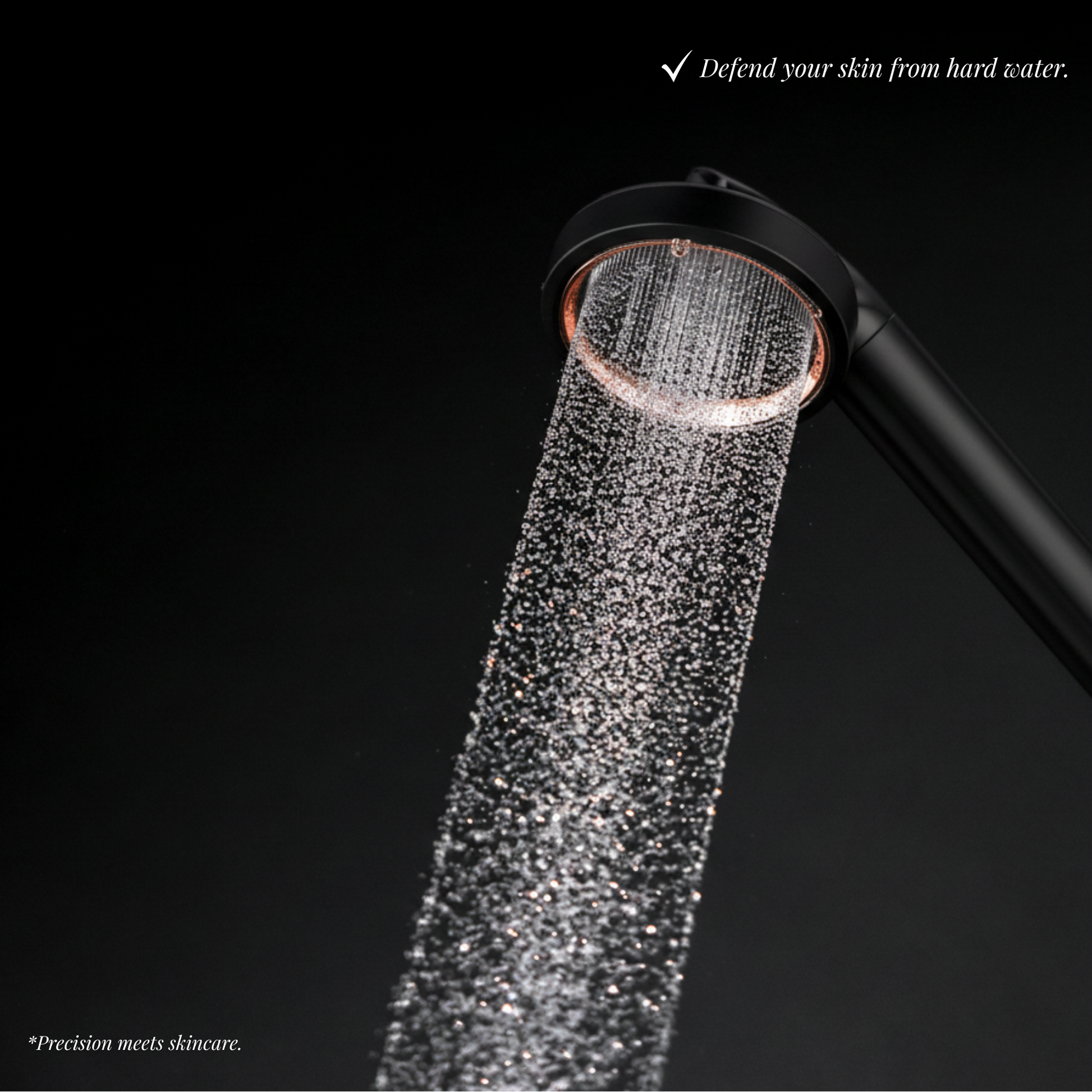 High-pressure water stream from a shower head, captured mid-flow with minimalist black background