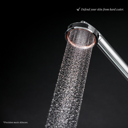 Close-up of high-pressure water stream from SOAH shower head on black background, illustrating advanced filtration and protection against hard water damage to skin.