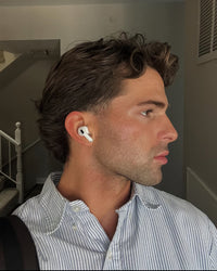 Alex from Dubai Marina sharing a five star review about reduced hair fall and a cleaner, fresher scalp after using the SOAH vitamin C shower head