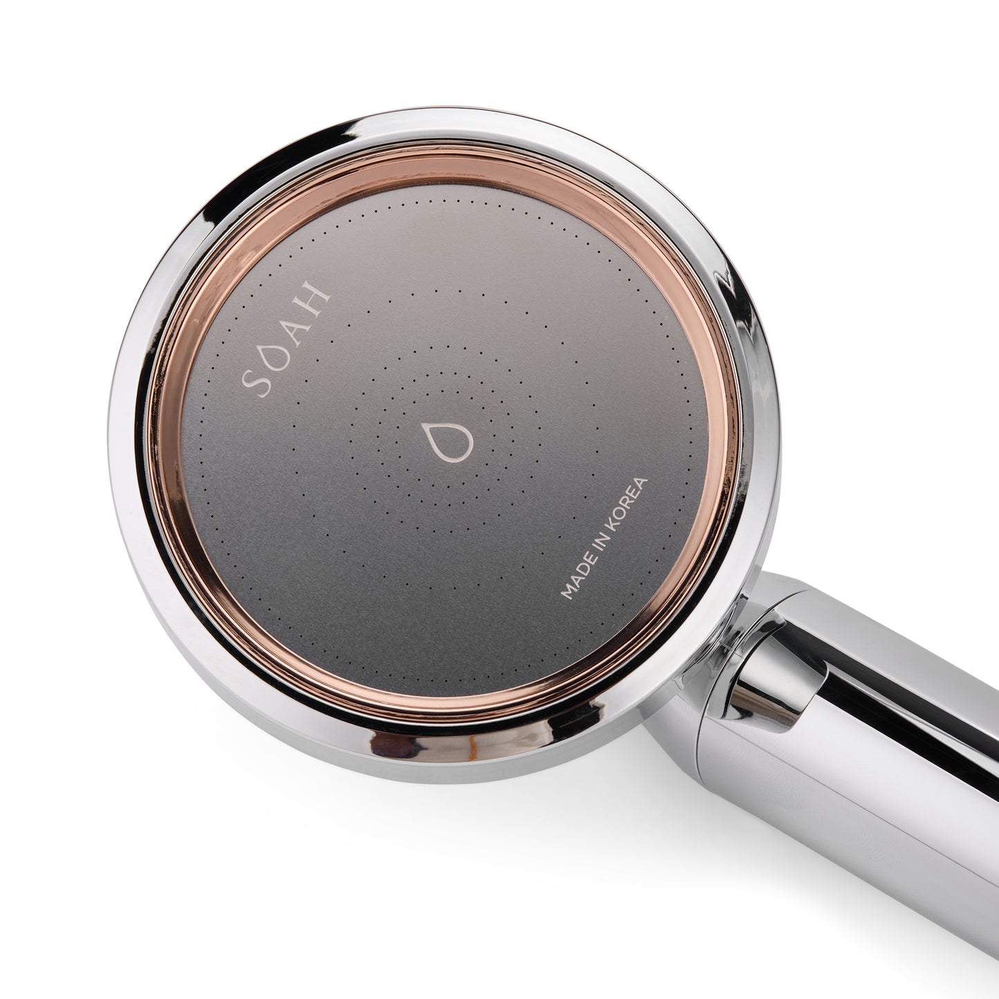 Close-up of SOAH Chrome Edition Vitamin C shower filter with rose gold and silver finish
