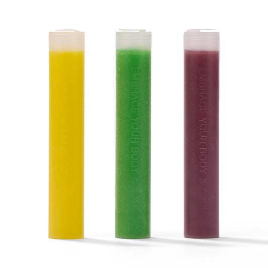 SOAH Vitamin C shower filters in Lemon (yellow), Green Muscat (green), and Tea Tree Lavender (purple) — top view on a white background.